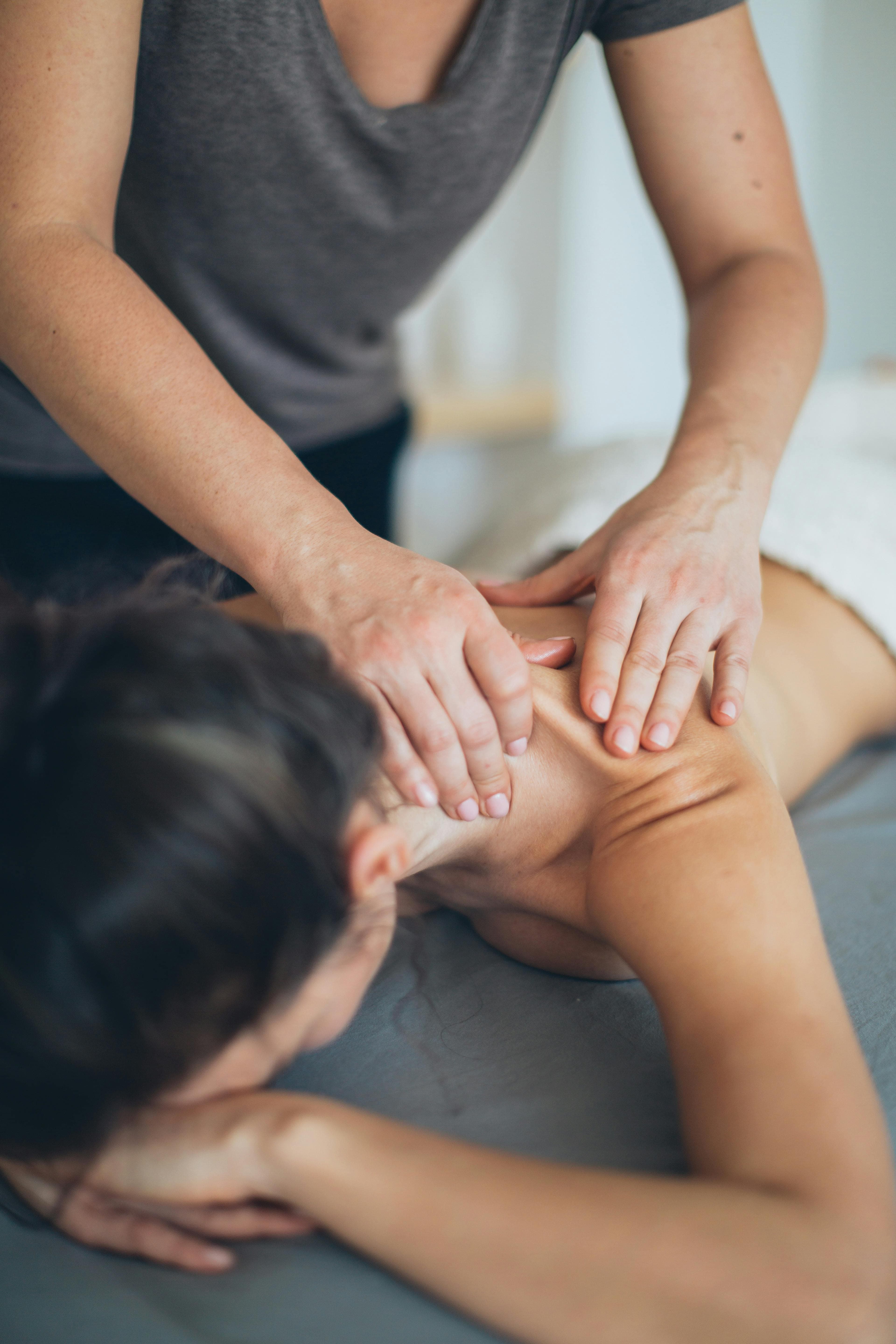 Physical therapist providing personalized care to patient